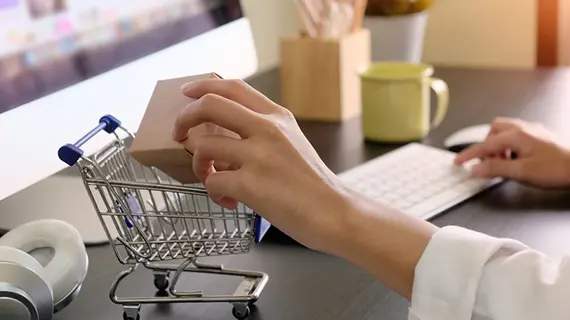 A miniature shopping cart.