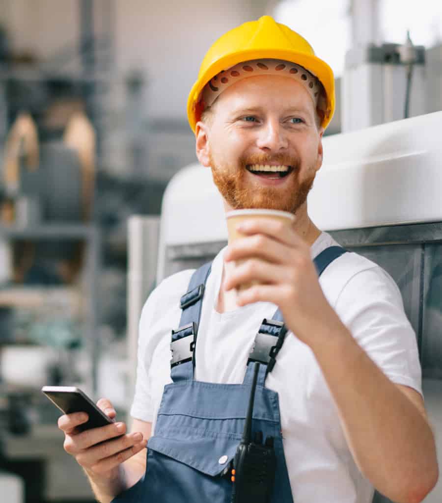 manufacturing-hero Worker drinking coffee.