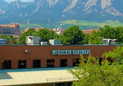 McGuckin Hardware Case Study McGuckin Hardware headquarters with visible tree line.