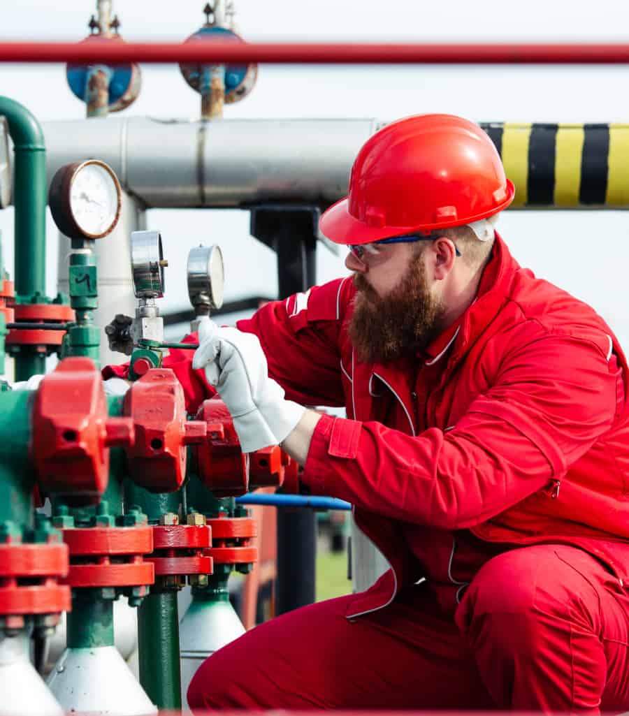 pvf worker checking some valves.