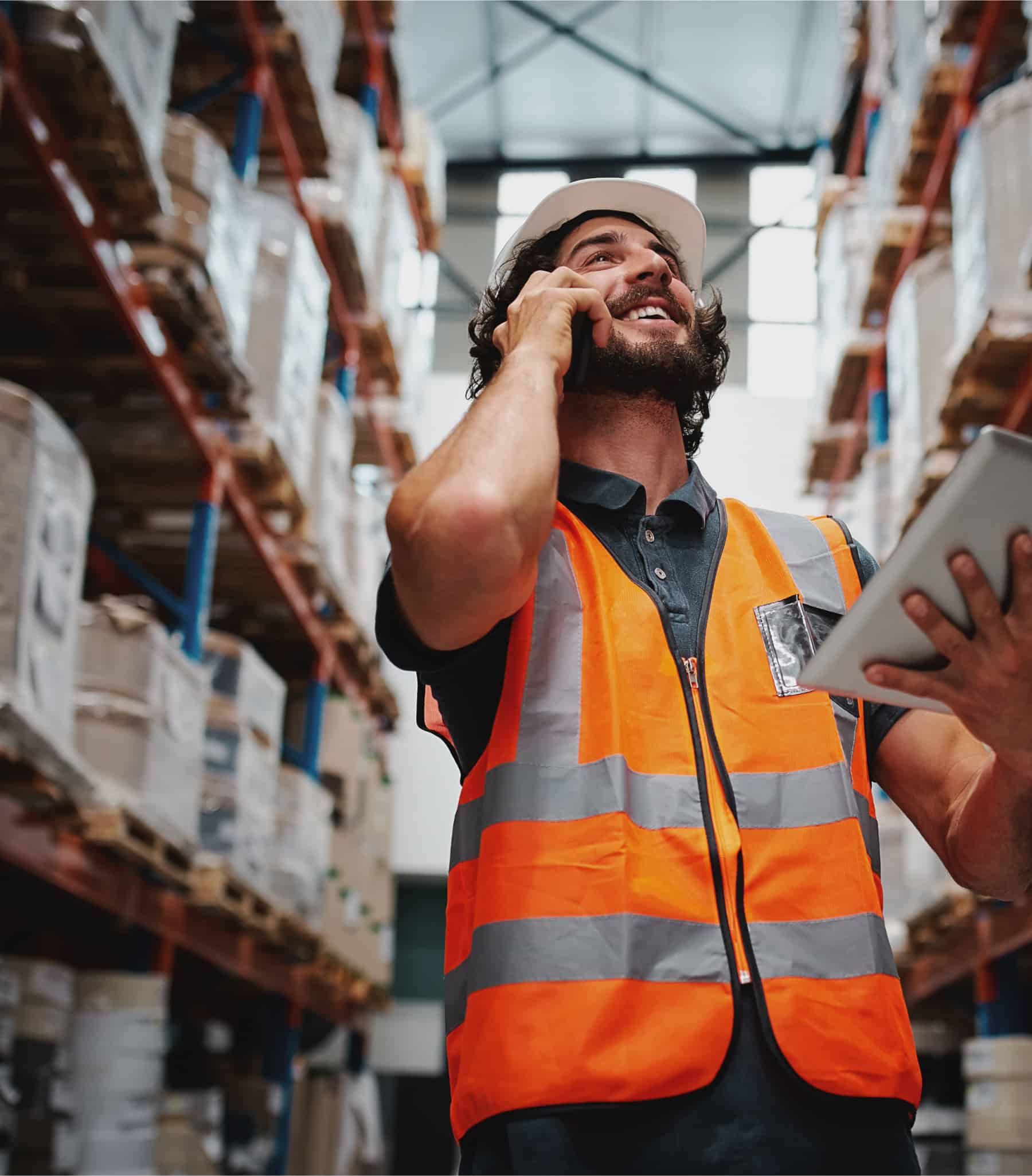 connect-hero Worker holding a tablet with one hand while talking on the phone.