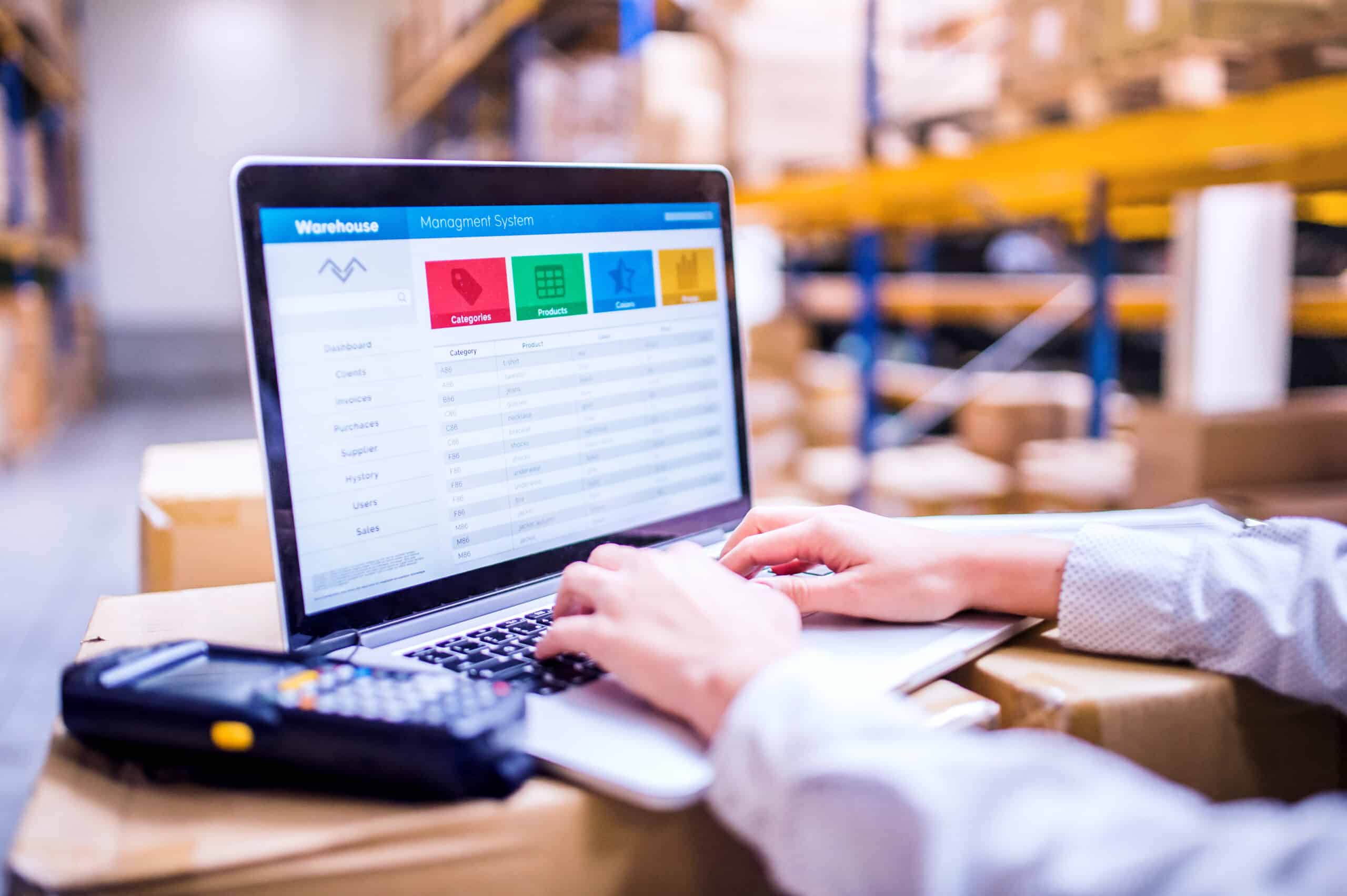 Woman warehouse worker or supervisor with laptop Preview image for Unilog case study.