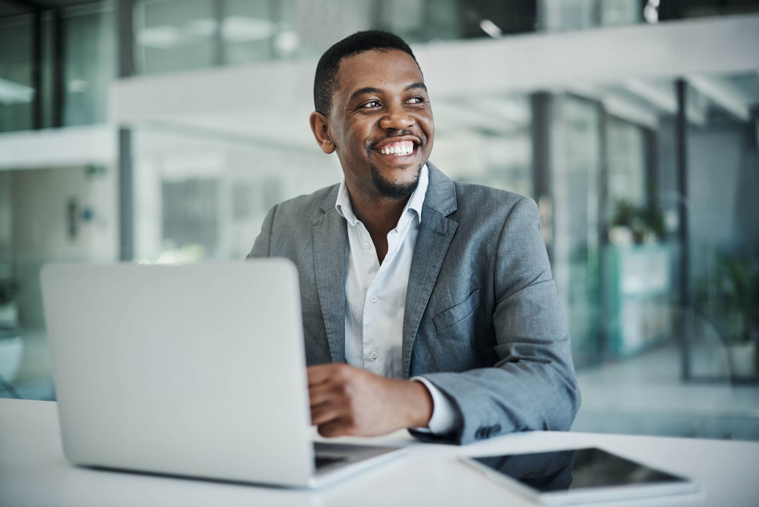 My end goal for this business is getting closer. Shot of a handsome young businessman sitting alone in his office and using his laptop. Medical Sales