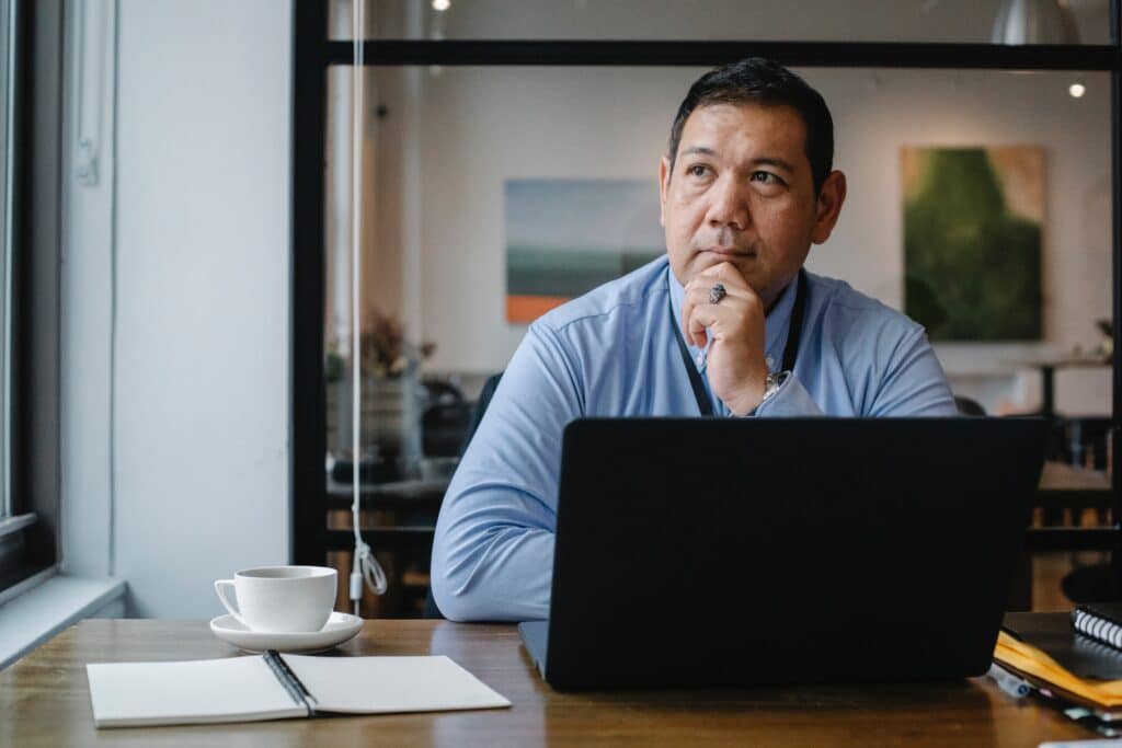 Man behind a computer