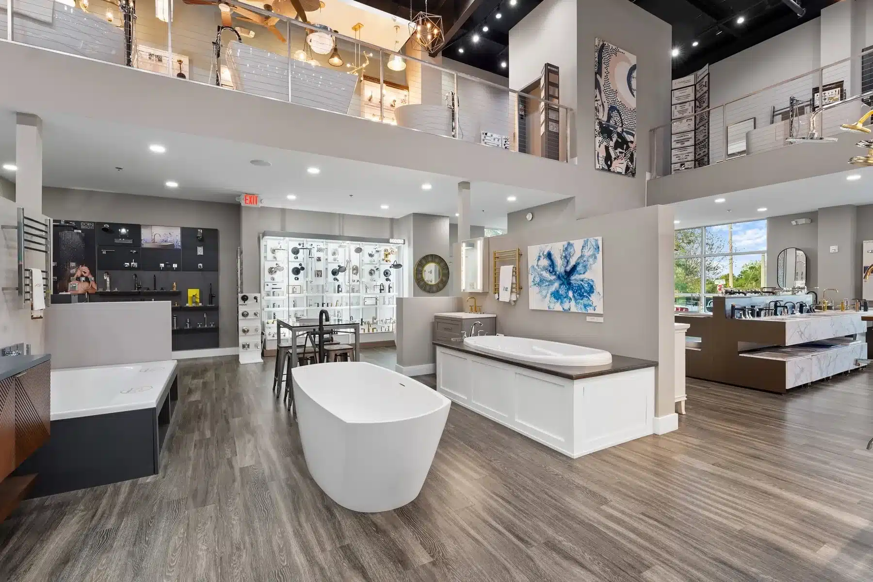 Freestanding tub and tile displays inside the Gorman&rsquo;s Gallery Kitchen & Bath Studio showroom