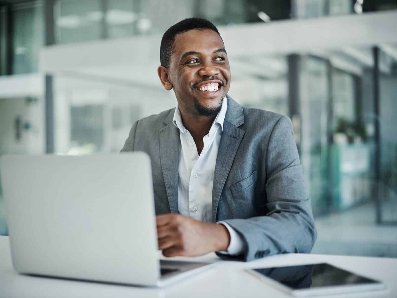 Pharmaceutical and medical distributor working at a laptop